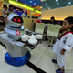 Illustration for article titled The Photographic History Of Robots As Restaurant Employees